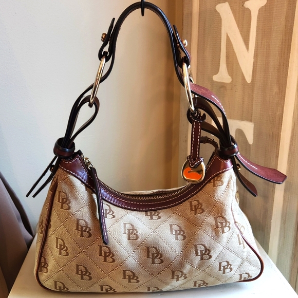 Dooney & Bourke Handbags - DOONEY AND BOURKE EUC Signature CANVAS AND Oxblood LEATHER SHOULDER BAG K5107847